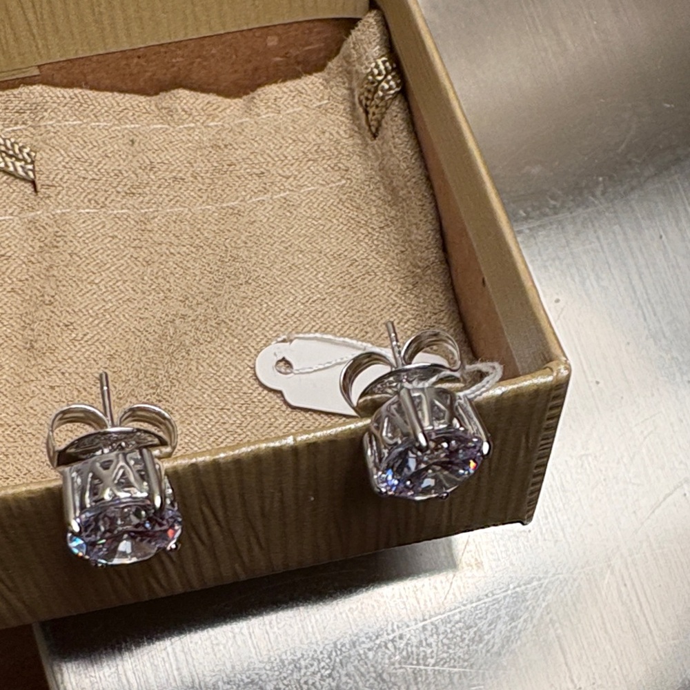 Elegant Silver Stud Earrings - Picture 3 of 10